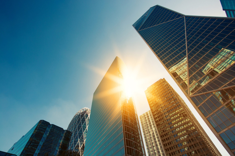 Skyscraper Glass Facades On A Bright Sunny Day With Sunbeams