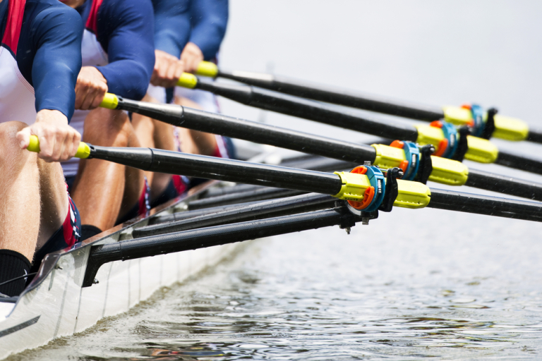 Close Up Of A Men's Quadruple Skulls Rowing Team seconds