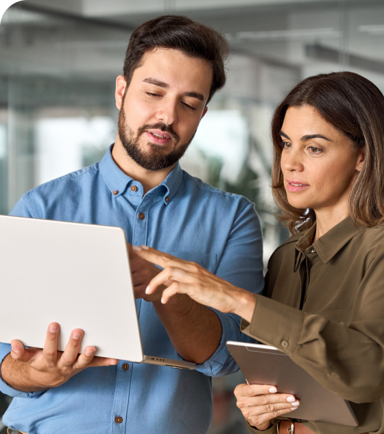 Commercial transactions attorneys discussing something on a computer screen.