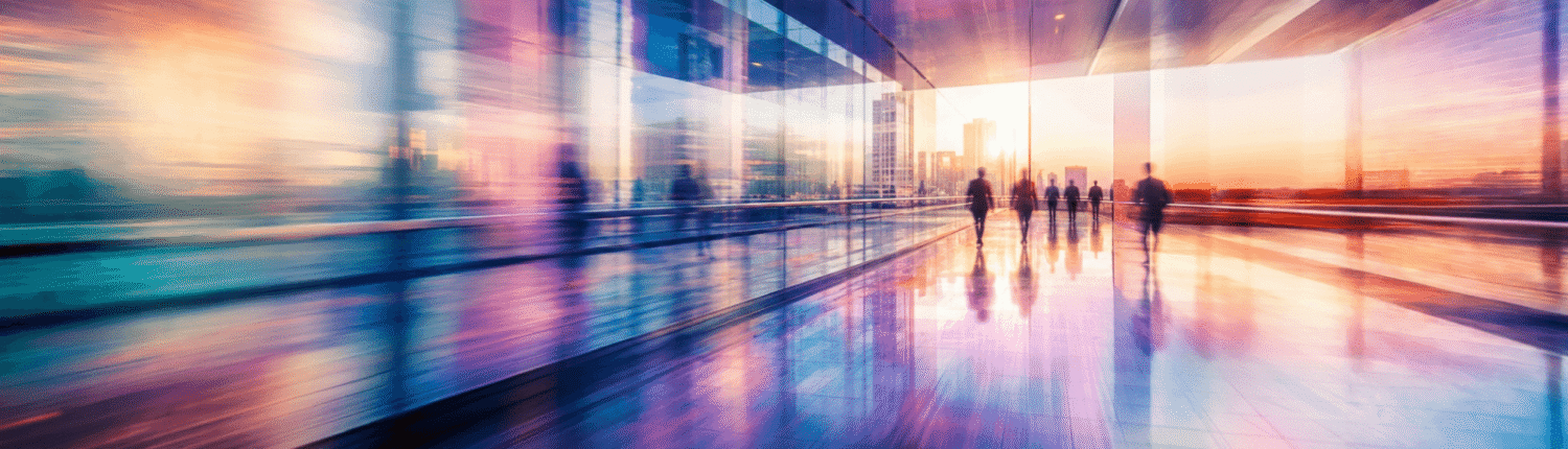 A motion-blurred, vibrantly colored corporate office corridor with silhouetted business professionals walking through a glass-walled space at sunset, symbolizing the fast-paced growth and transformation of in-house legal teams using alternative legal service providers.