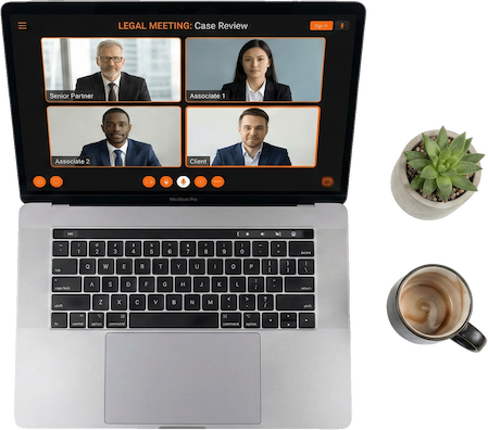 Remote legal meeting on a laptop with a video conference case review, workspace coffee cup, and office desk setup.