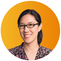 Headshot of Ji-Hyun Park, Global Head of Legal at Intercom, smiling and wearing glasses, against an orange circular background.